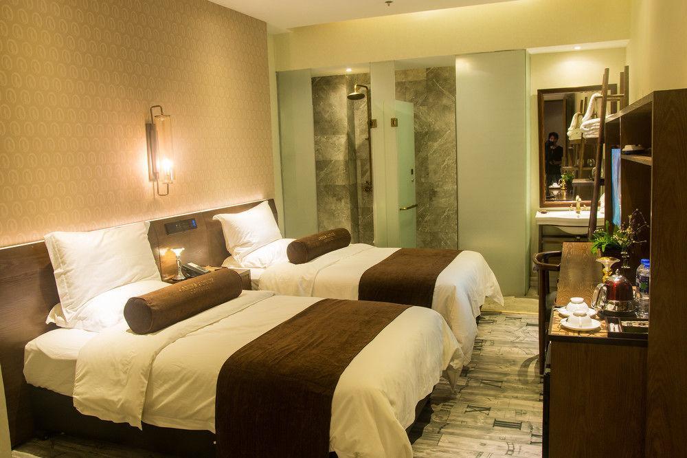 เจเจ คอฟฟี ธีม โฮเต็ล กวางเจา เอ็กซิบิชั่น เซ็นเตอร์ Hotel กวางโจว ภายนอก รูปภาพ